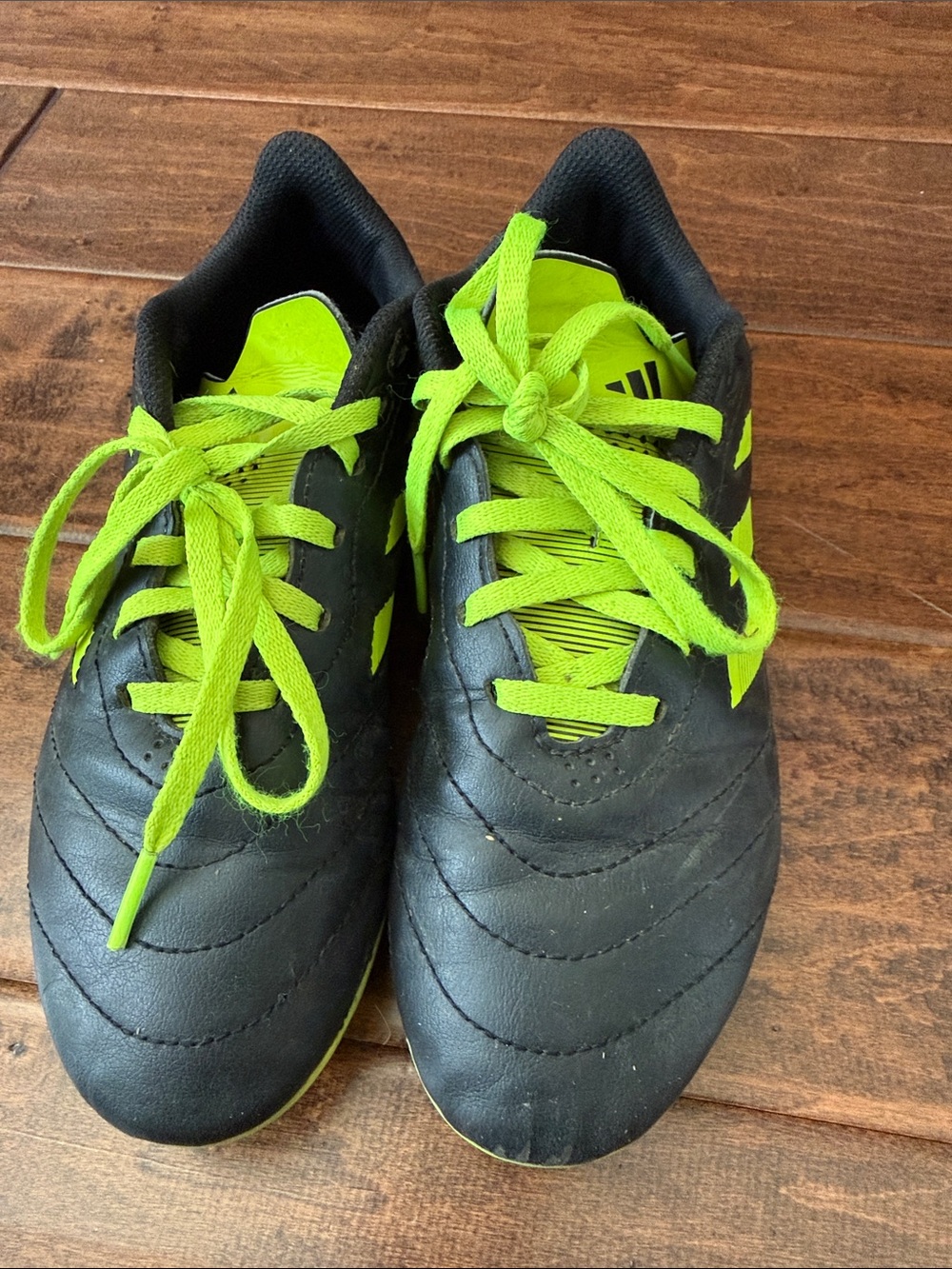 Kids Black and Neon Green Soccer Cleats size US4 Like New